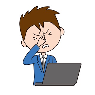 目の疲れを訴える男性